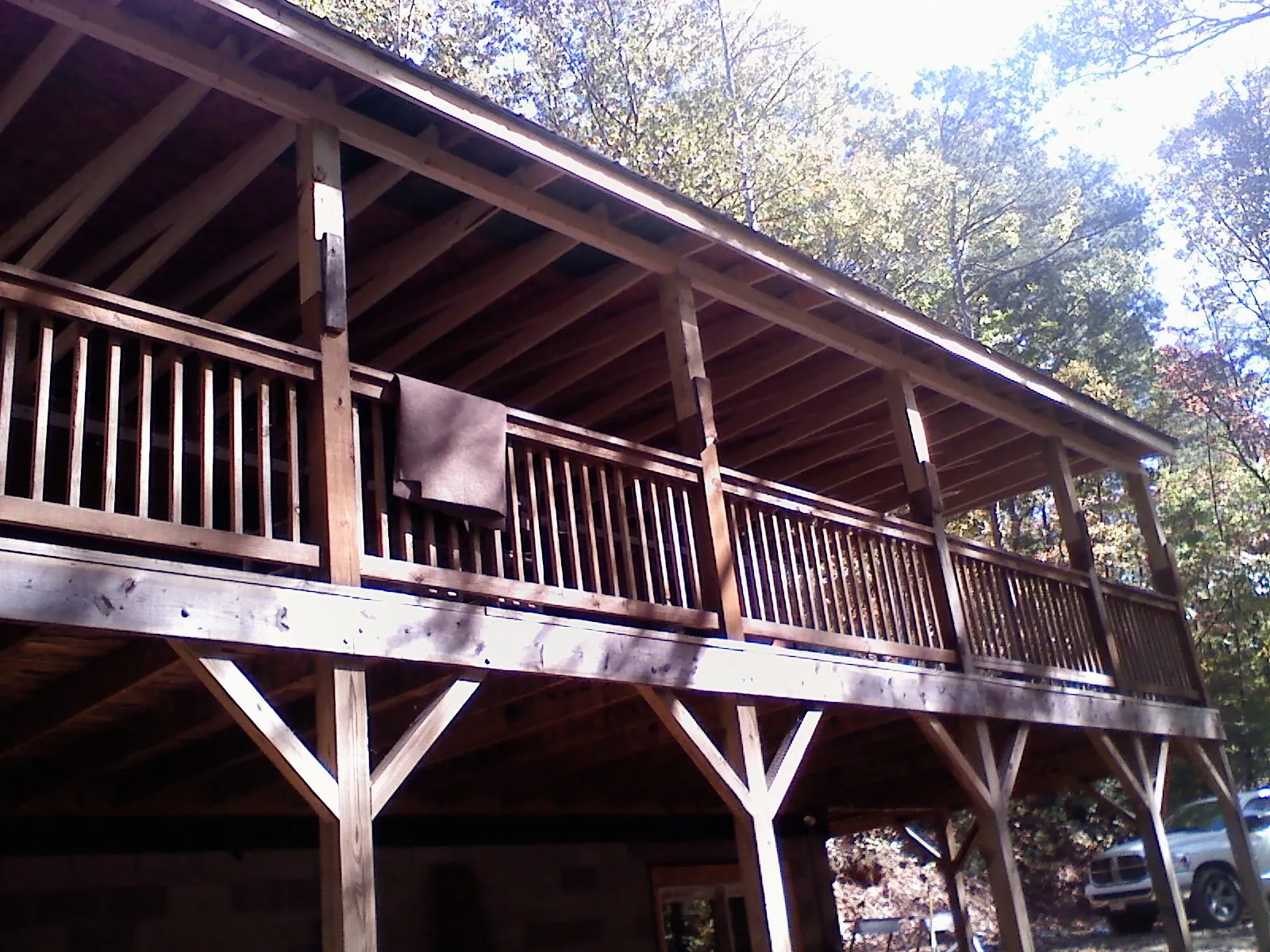 Timber framing under a new elevated porch and deck — Roof Leak Repair in Wickenburg by Roofing Brothers